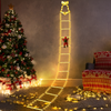 Dekorace Lezoucí Santa